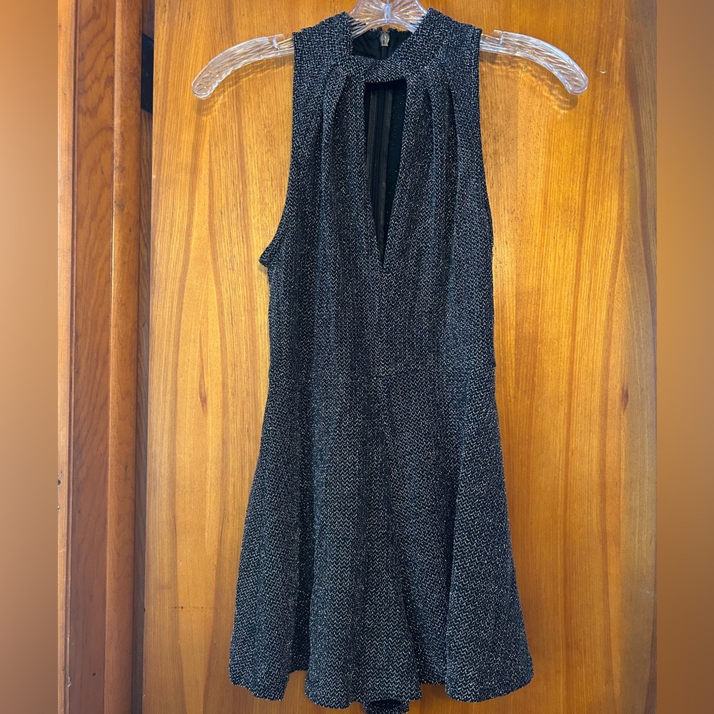 High neck, deep V front black dress with silver